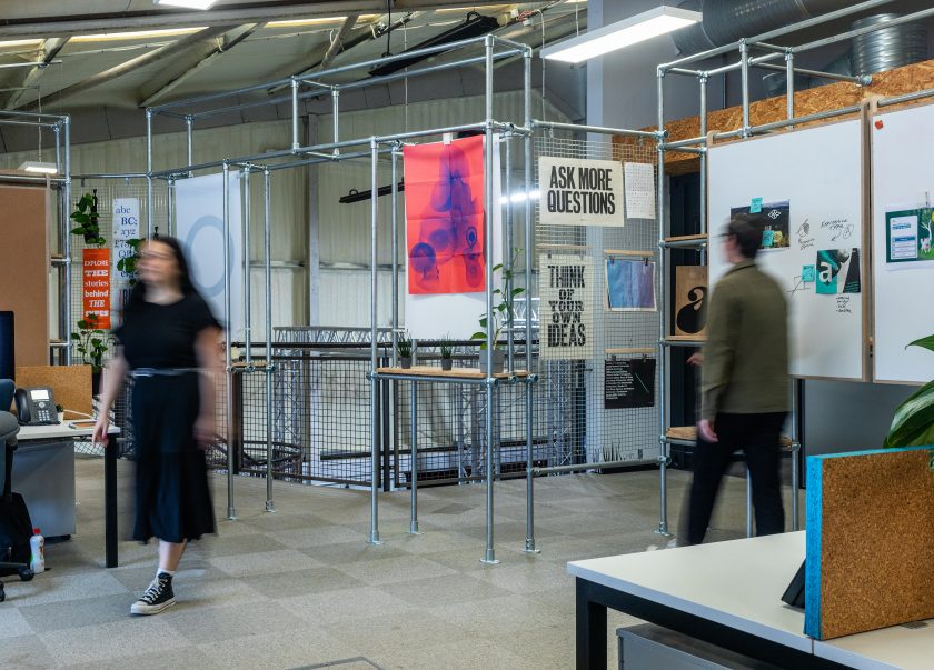 Two members of the Orchard integrated team walking through the studio